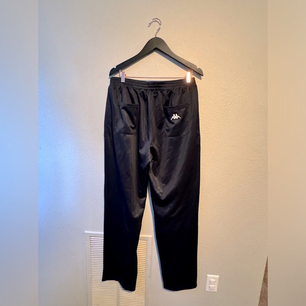 Kappa Track bottoms that pair back to the track jacket